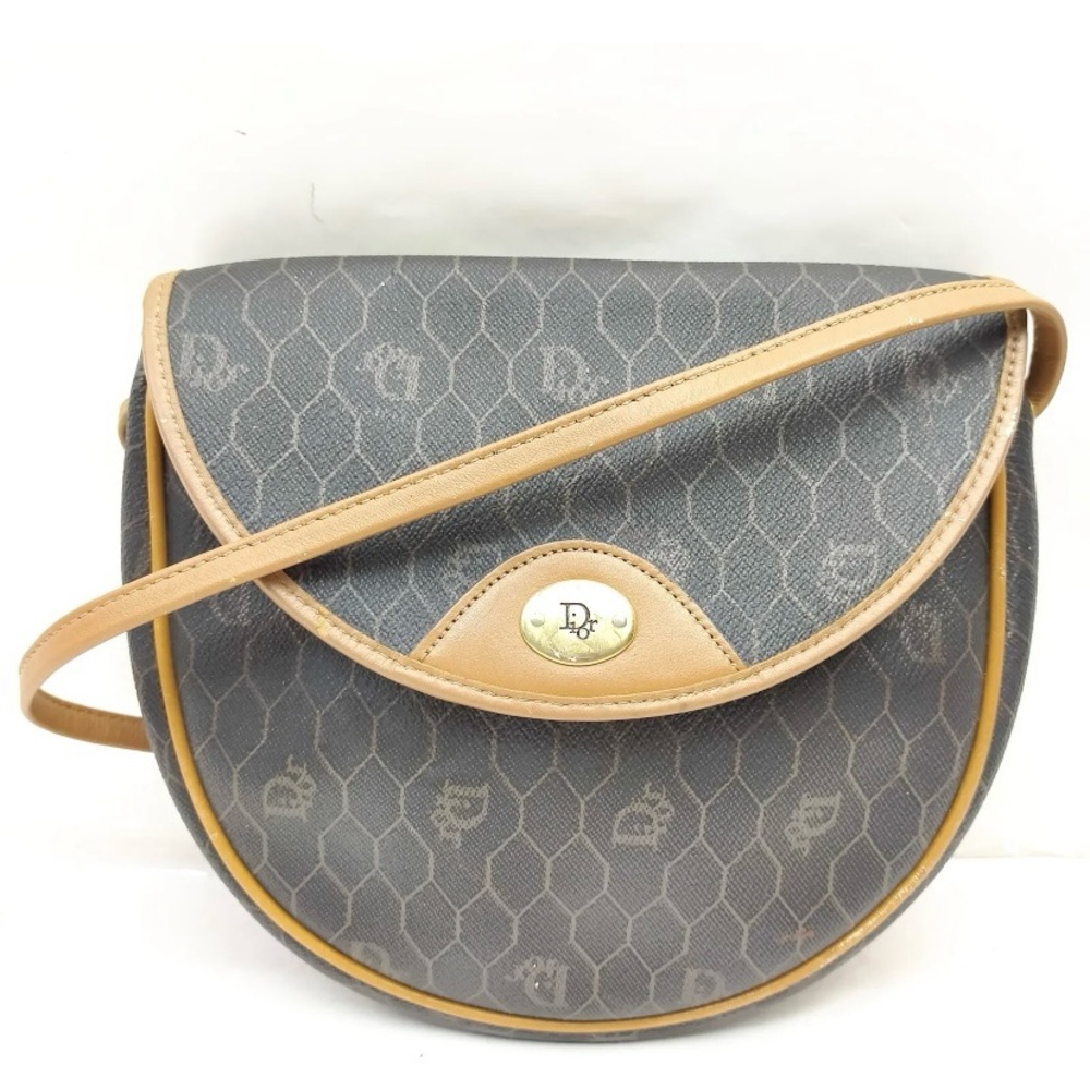 [0059] Vintage Christian Dior Crossbody Bag in Honeycomb Canvas